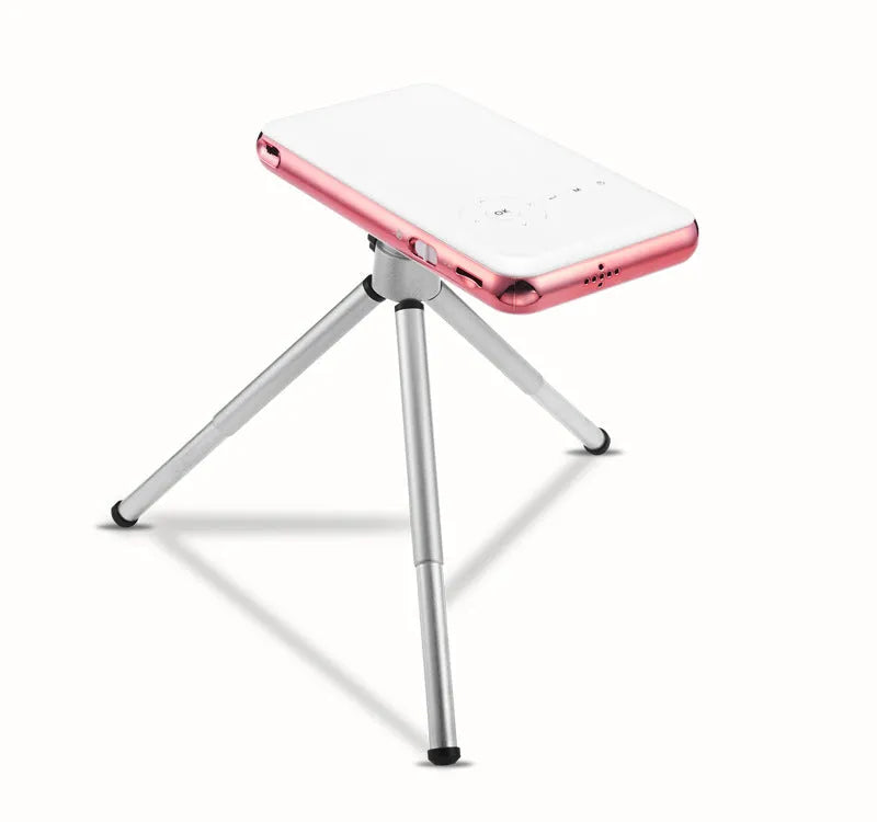 White rose gold miniature DLP Android projector showing compact 145mm design with smartphone connectivity