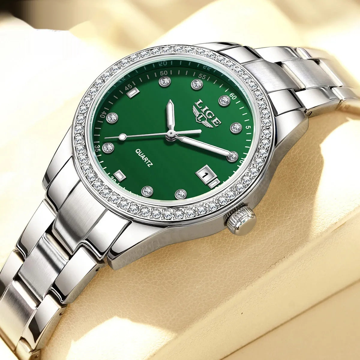 Women's fashion quartz watch with stainless steel case, diamond bezel, and luminous hands in silver colour options