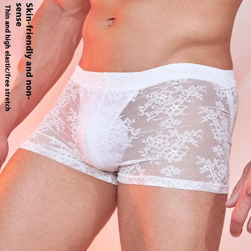 Men's black boxer briefs with white lace trim on the leg opening.