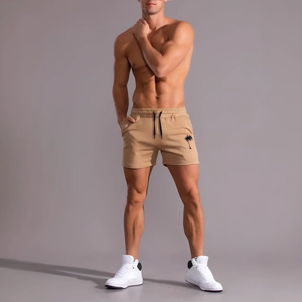 Men's khaki coconut print sports shorts with straight cut design and micro elastic polyester fabric