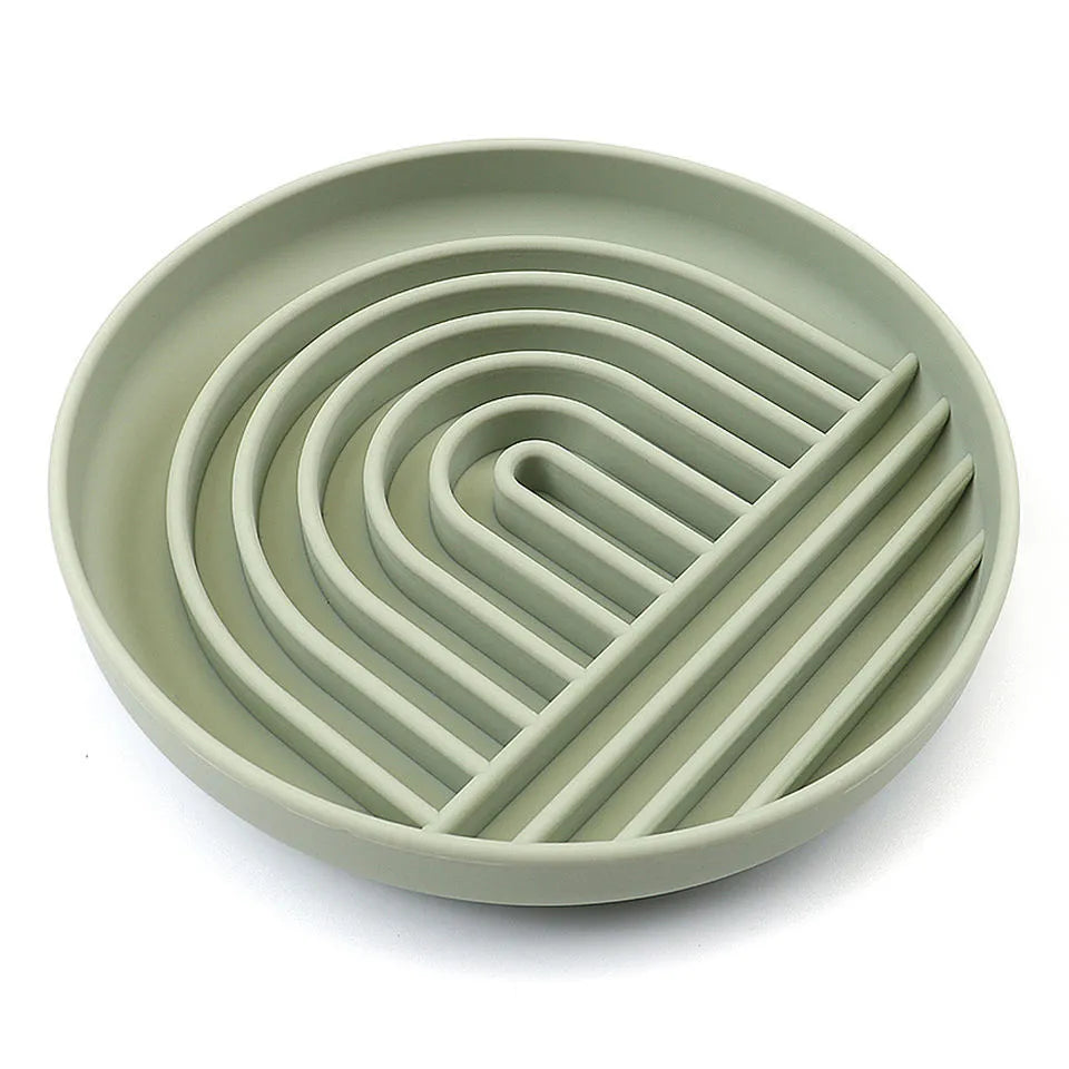 Silicone dog slow feeder bowl with textured ridges, shown in mustard green colour.