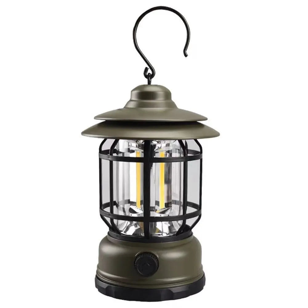 Dark green portable camping lantern with super bright LEDs, shown with a dry battery for scale.