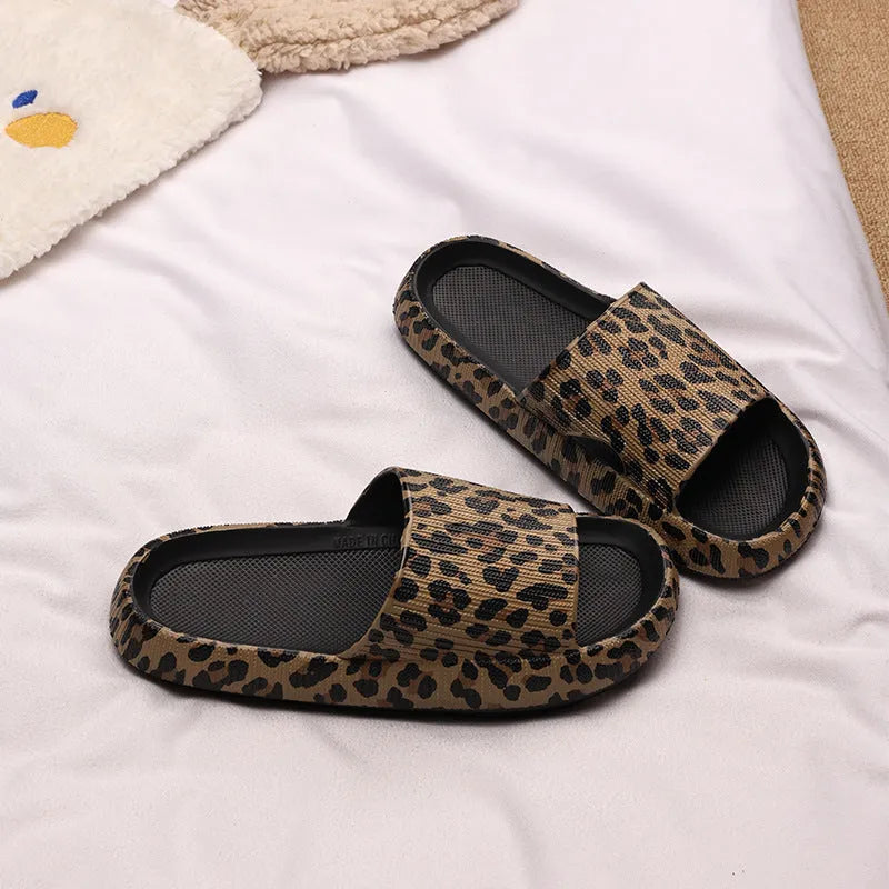 Women's leopard print slipper with thick EVA sole shown in multiple colour and print options.