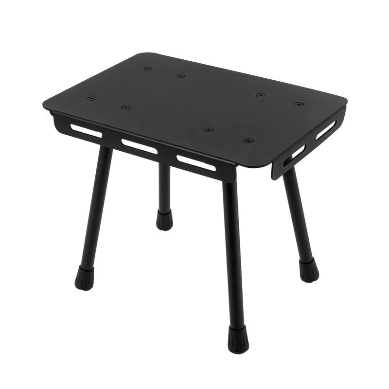 CLS Outdoor aluminium folding camping stool with PU cushion next to its bag that converts into a small table.