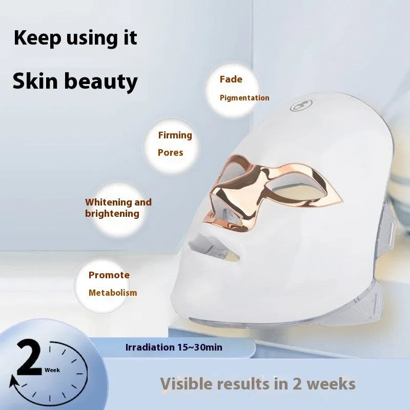 Rechargeable manual touch LED beauty face mask in white rose gold edge colour with fixing strap