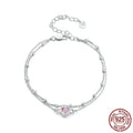 Women's 925 sterling silver bracelet with a small heart charm on an adjustable chain.