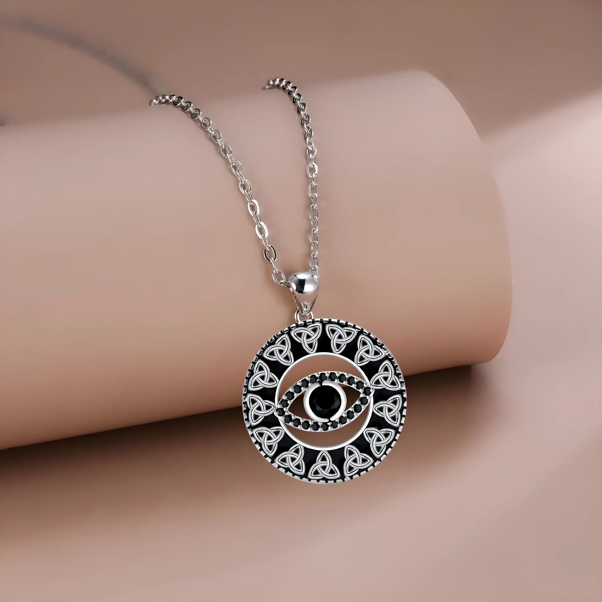 Copper electroplated Devil's Eye pendant necklace with a detailed cross chain for women.