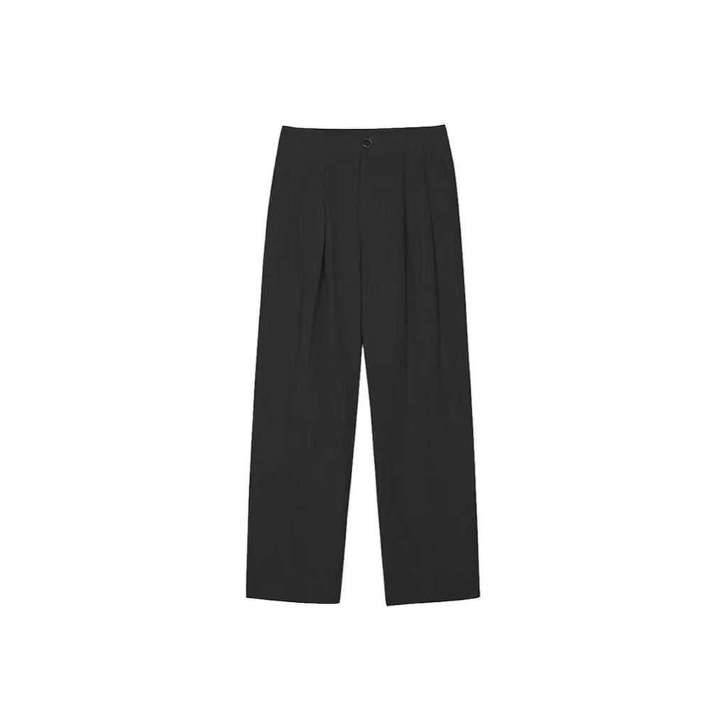 Man wearing apricot coloured loose wide-leg cotton linen trousers with a pencil leg opening.
