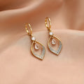 Women's copper zircon water drop tassel dangle earrings with gold or silver ear buckles.