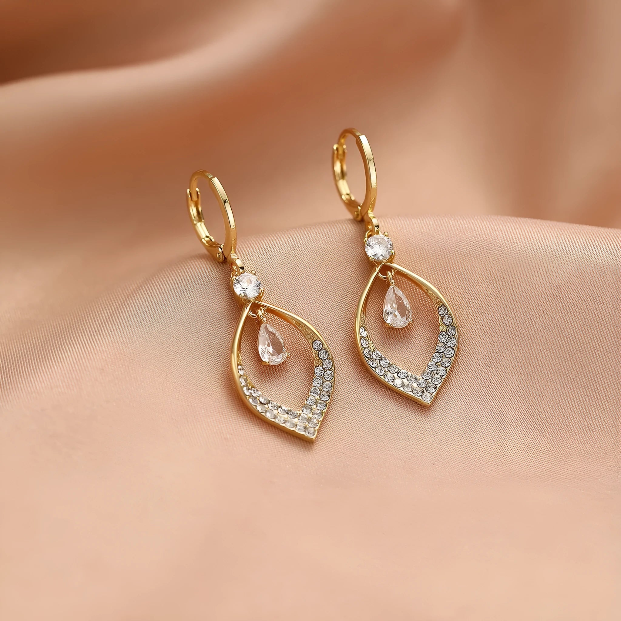 Women's copper zircon water drop tassel dangle earrings with gold or silver ear buckles.