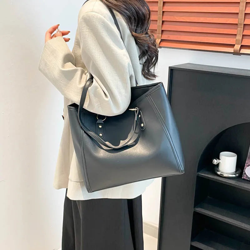 Korean style shoulder underarm bag in black PU leather with horizontal square shape and sandwich pockets