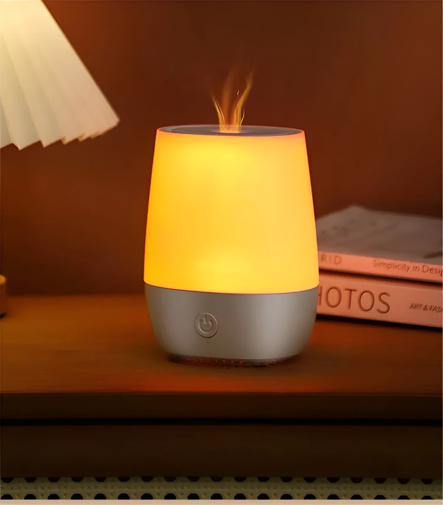 White USB aroma diffuser with simulated flame effect and compact design for bedside use