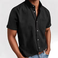 Men's loose fit short sleeve shirt in cotton blend fabric showing single-breasted cardigan styling