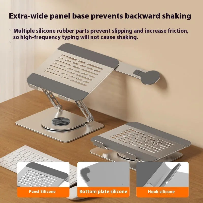 Silver carbon steel laptop stand with 360-degree rotation and a side-mounted magnetic phone holder.