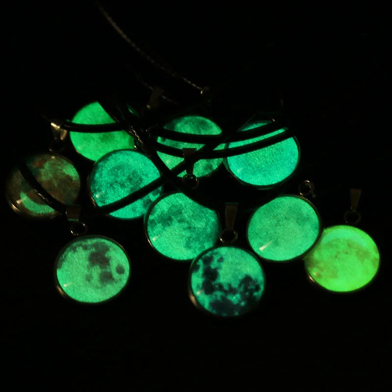 Alloy necklace with luminous glass pendant showing Christmas moon night sky and constellation design.