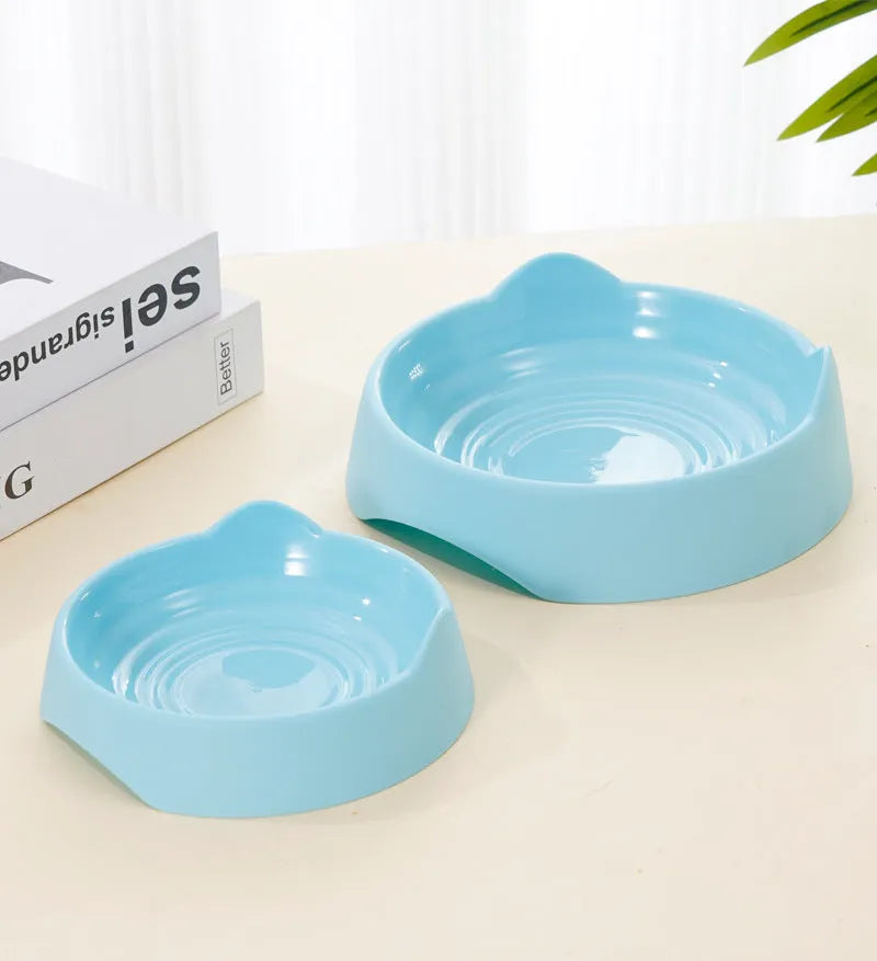 Blue ceramic dog slow feeder bowl with raised maze cups for fast-eating puppies