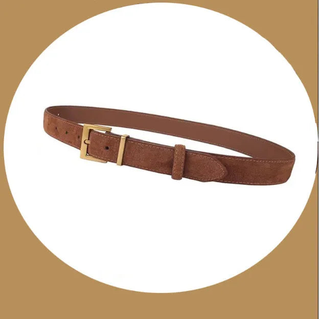 Ladies' black leather pin buckle belt with quadrilateral alloy buckle on a white background.