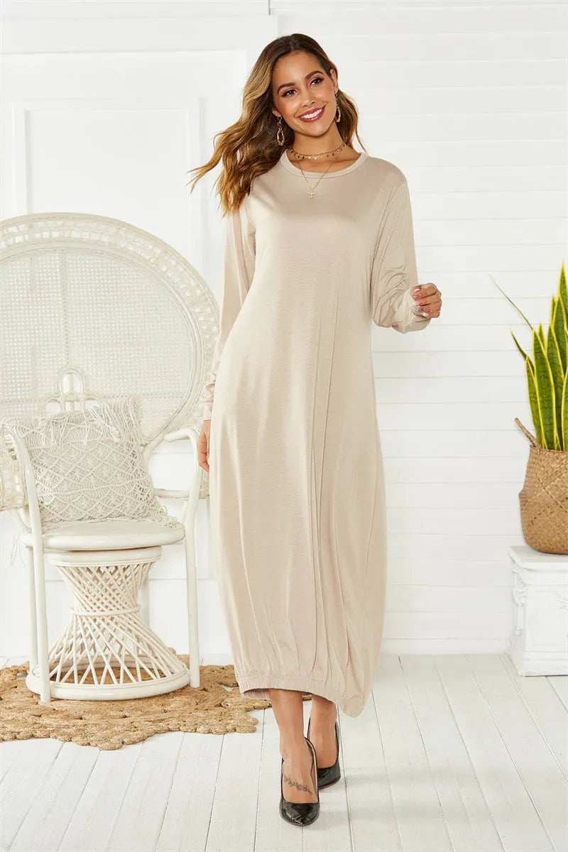 Loose lantern dress with lace-up crew neck in black or grey polyester knit fabric