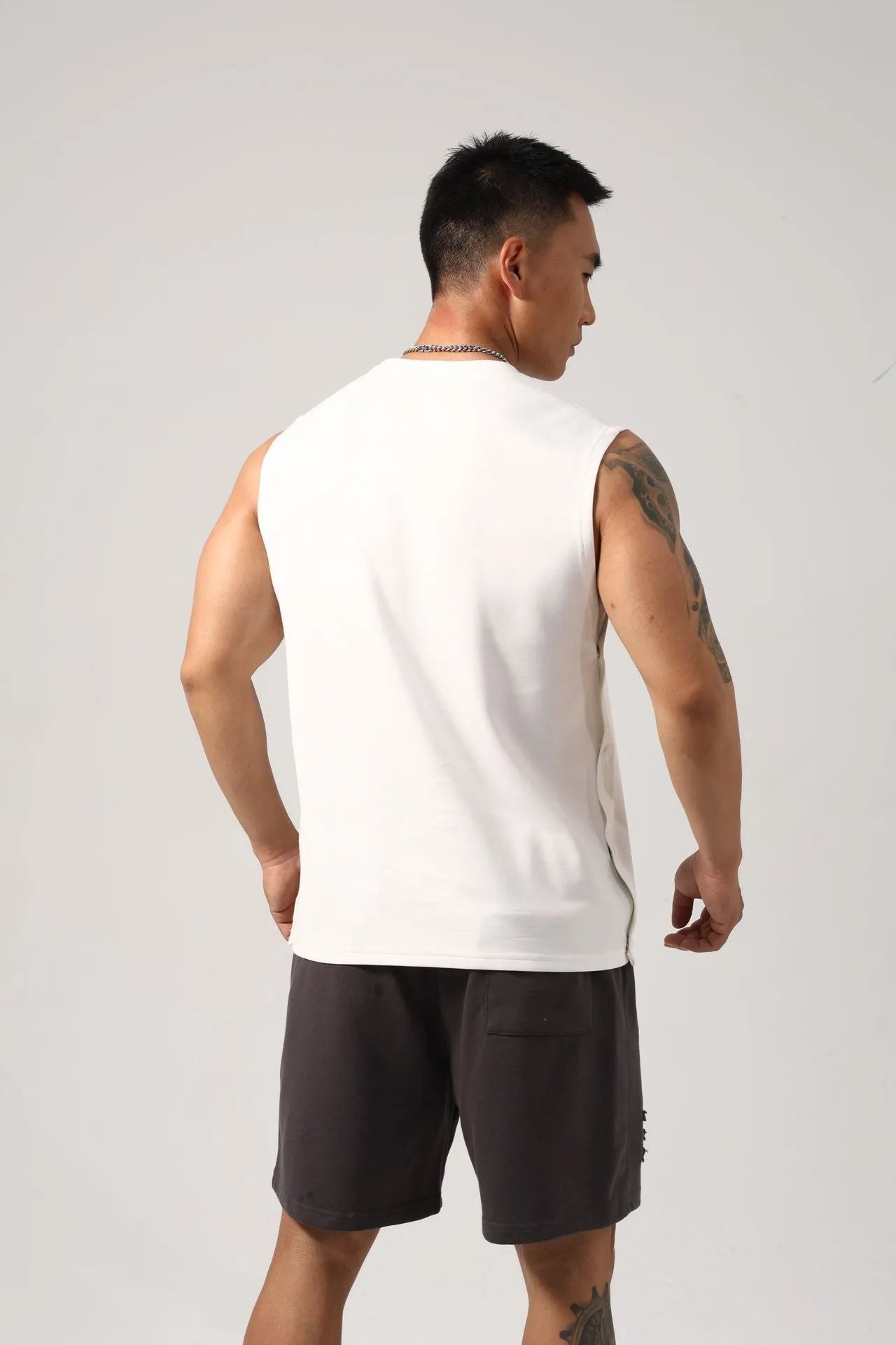 Korean style men's cotton fitness vest with hidden hook side openings in solid colours