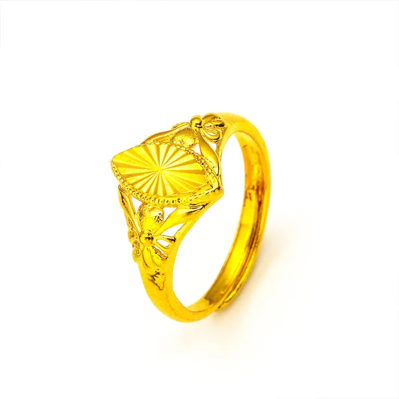 Gold electroplated open geometric flower ring with textured brass construction