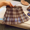 Girls' plaid pleated A-line skirt made from cotton blend fabric with a full lining.