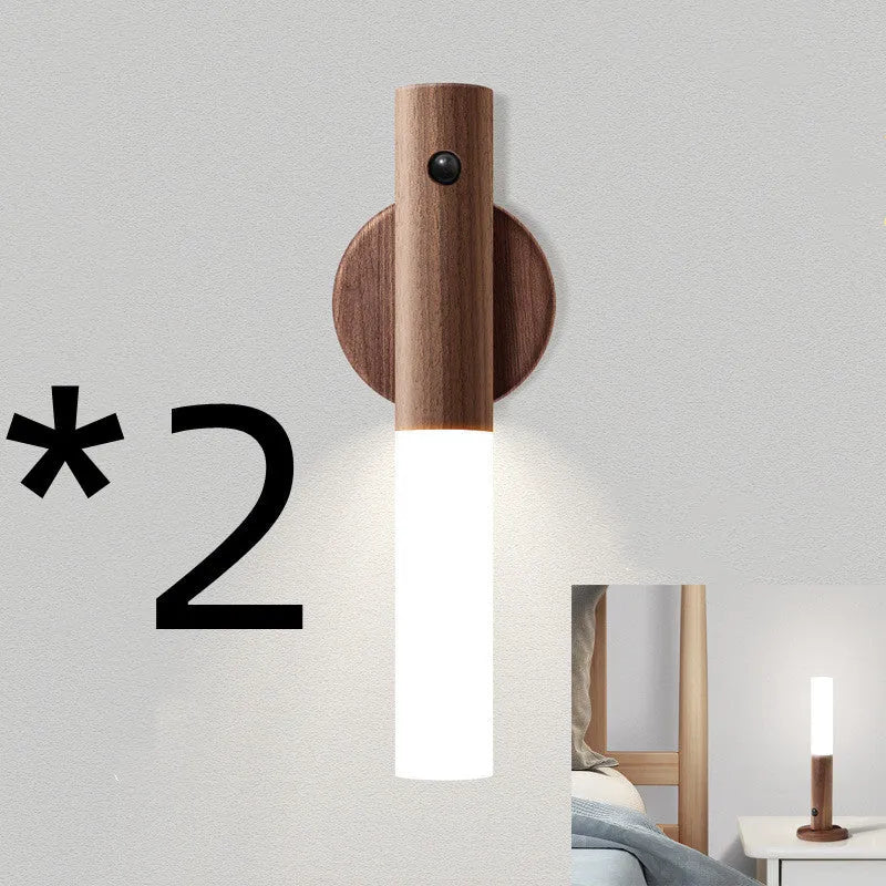 Smart sensor LED desk lamp in wood and glass, showing compact size and warm white light.