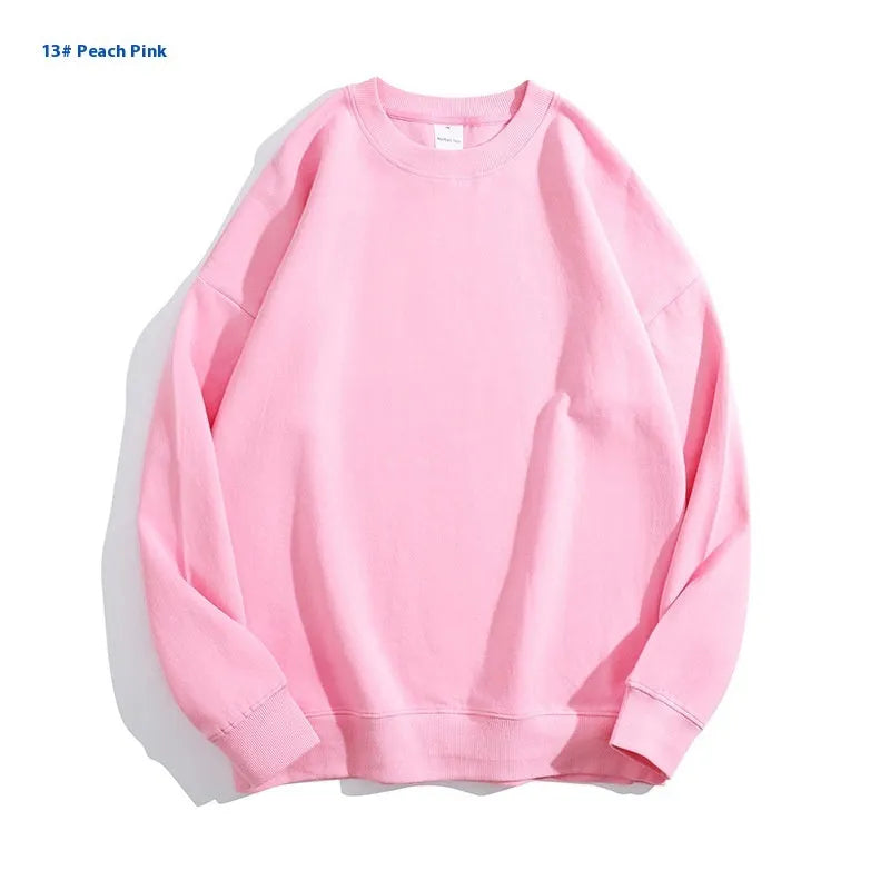 Women's loose fit cotton off shoulder sweater in a solid colour with round neck and long sleeves.