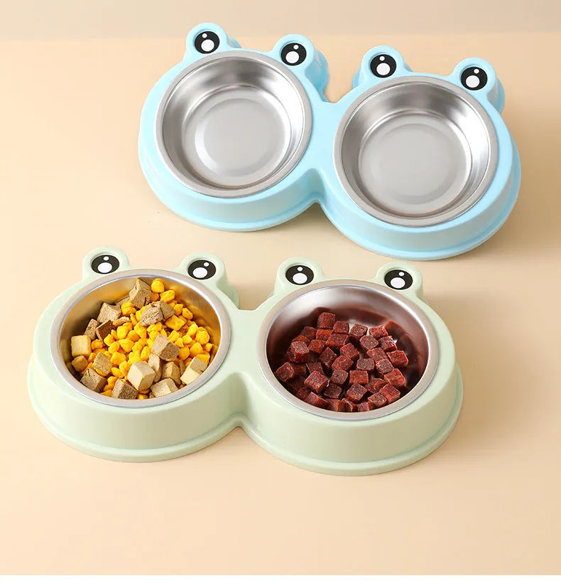 A stainless steel pet bowl with two compartments for water and food, shown in blue.