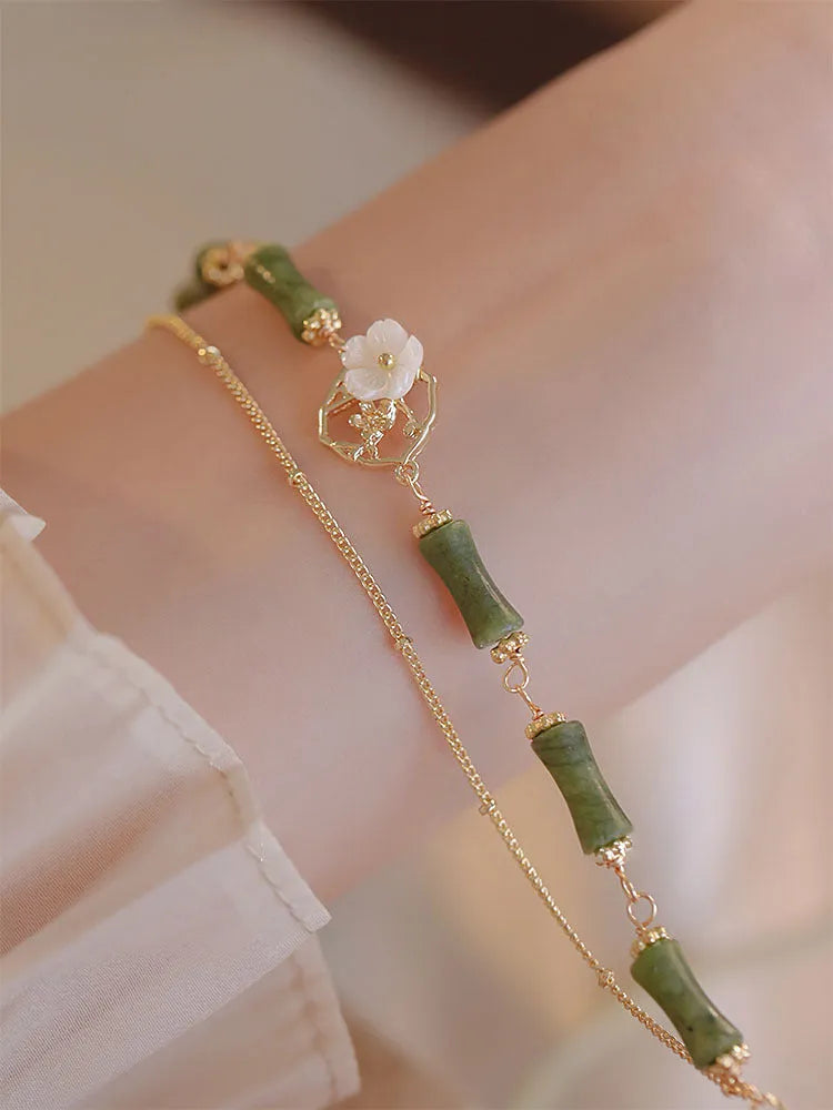 Natural olivine double layer bracelet with Bells of Ireland charms and olive branch detailing