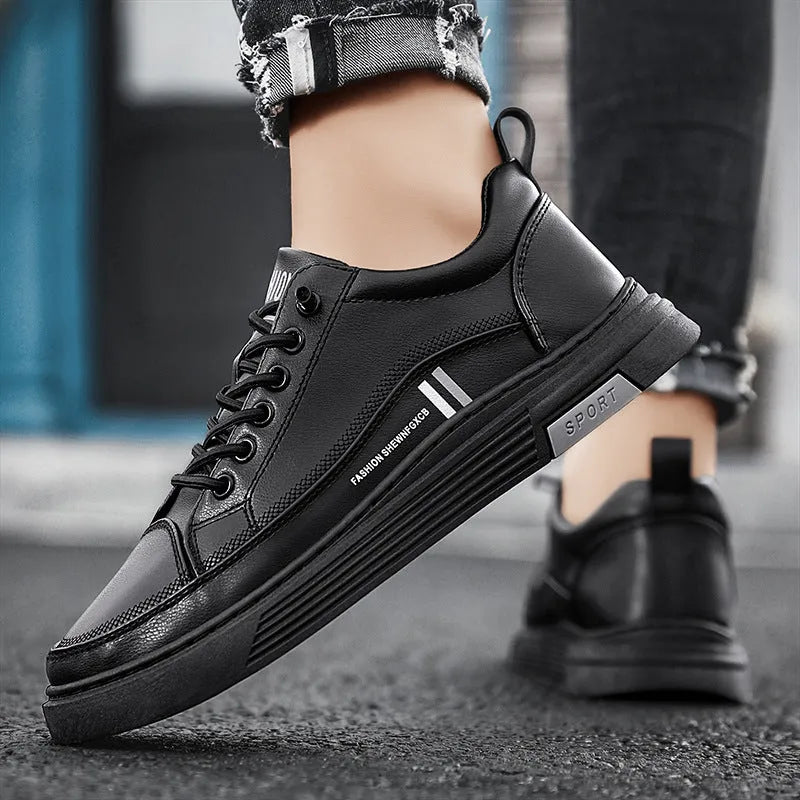 Men's low-top skateboard shoes with elastic band in white or black colour with stitching details