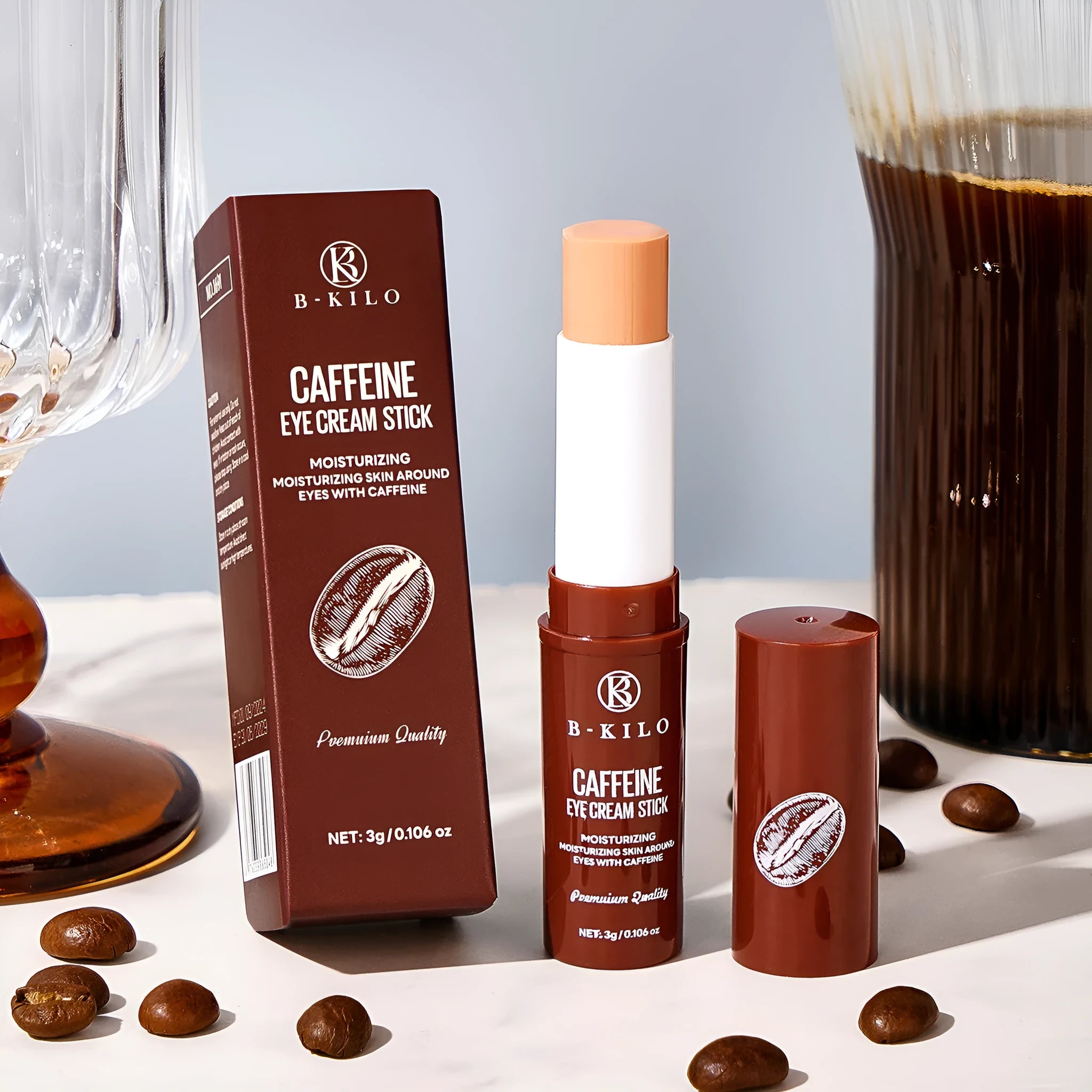 Caffeine eye cream stick in a white tube for hydrating skin and reducing fine lines and dark circles.