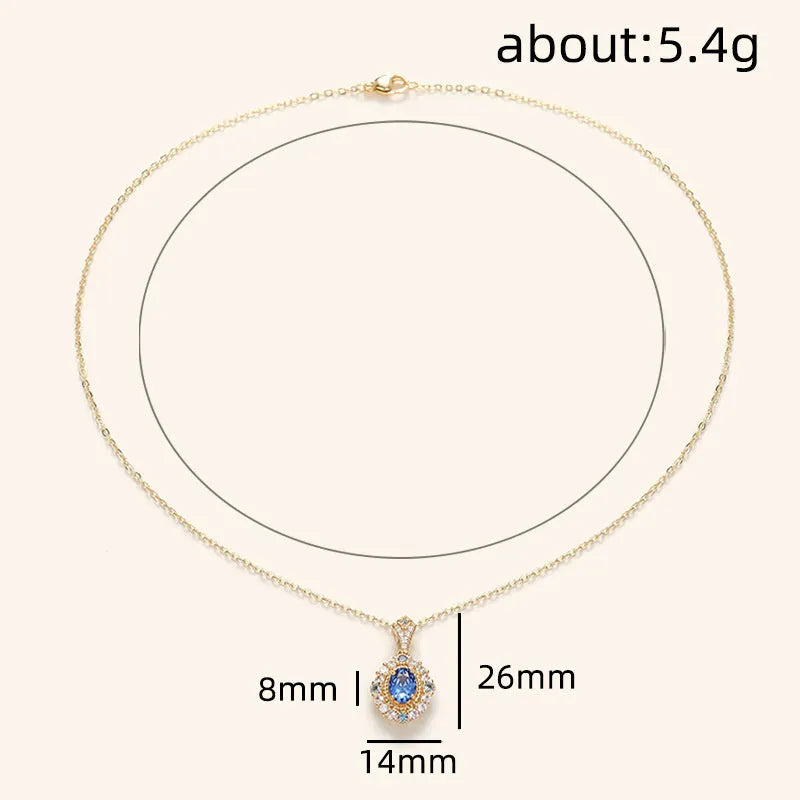Golden women's necklace with mixed gem inlaid pendant on an adjustable copper box chain.