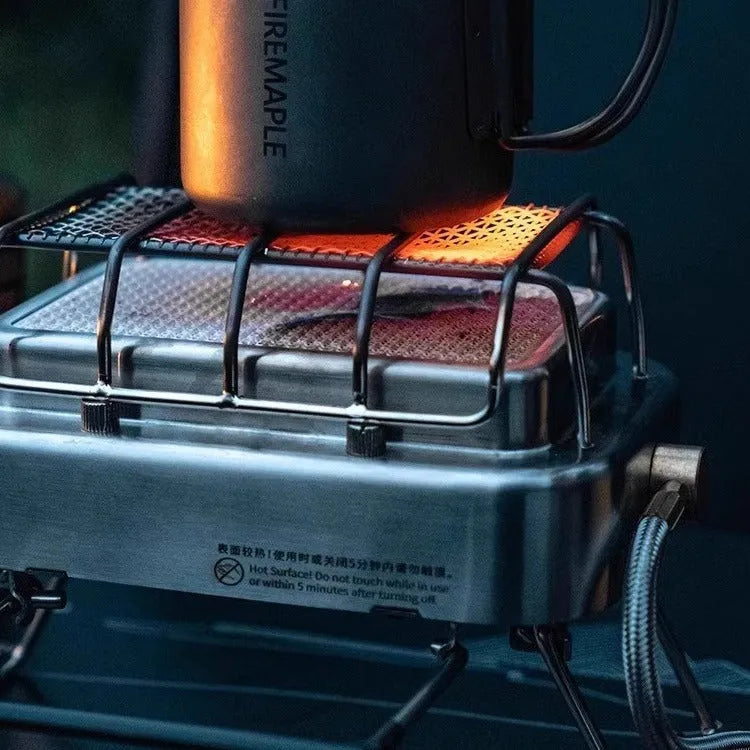 Outdoor heating stove showing expanded 180x167x125mm metal construction with voltage regulator