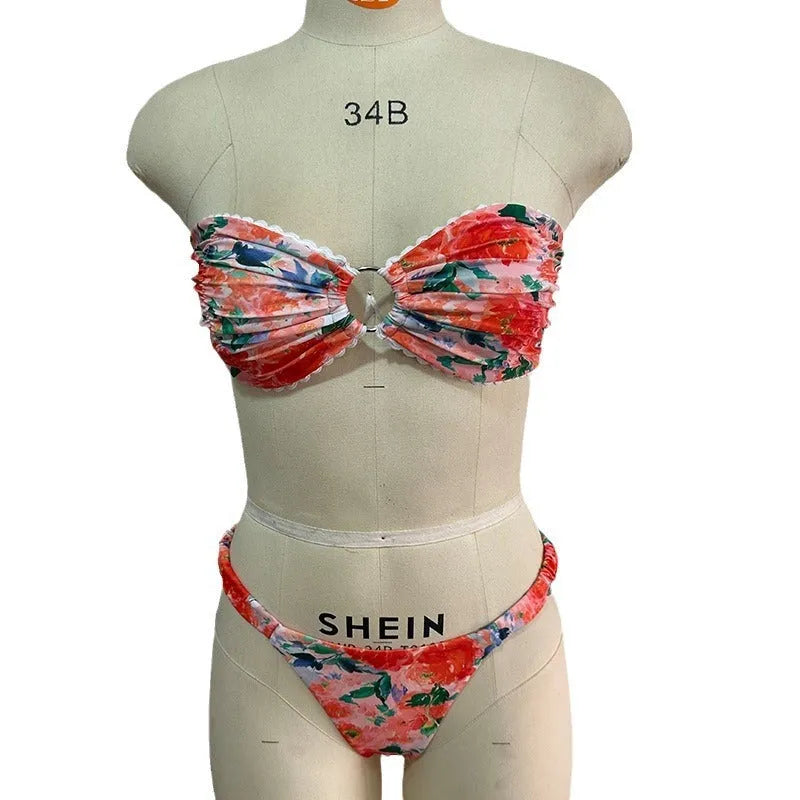 Printed tube top bikini set with lace detail and floral pattern in blue colour