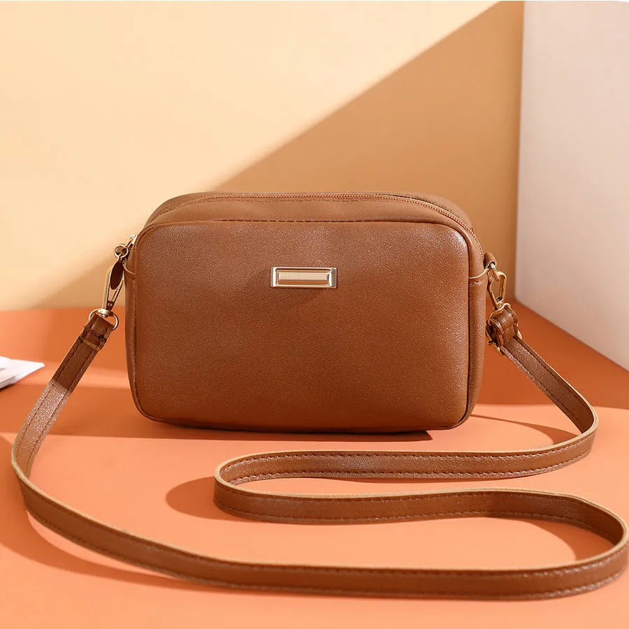 Women's soft PU shoulder bag with three-dimensional pocket in urban simplicity style